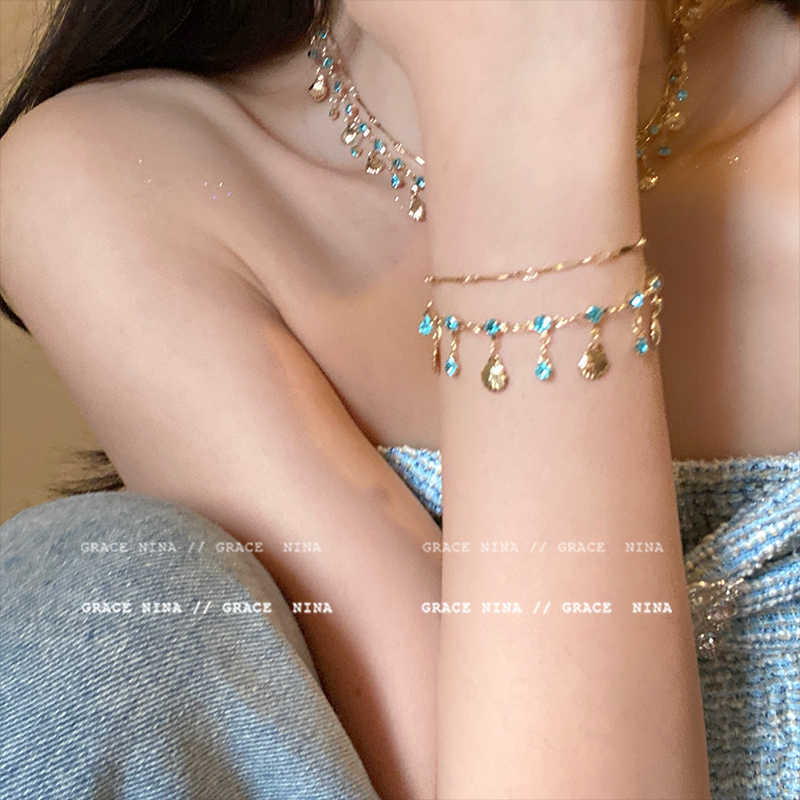 Blaues Diamant-Muschelarmband und Halskettensatz - 1