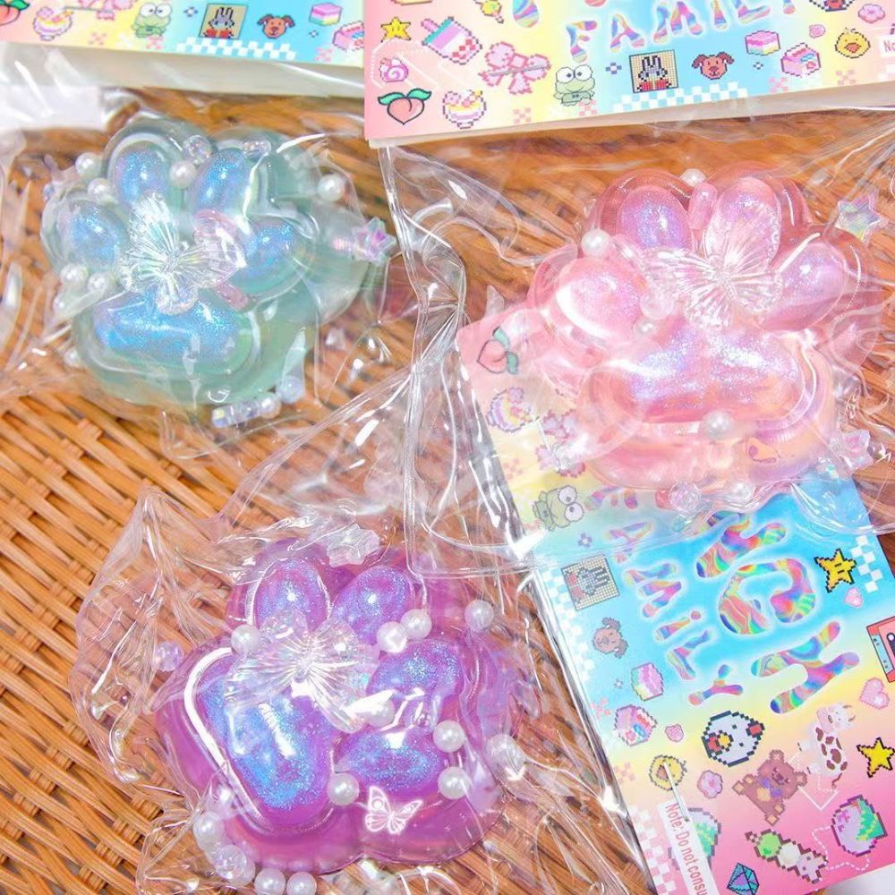 Wholesale crystal cat paw soft toy, transparent TPR/ultra-soft silicone plush cat paw soft toy with a muddy texture.