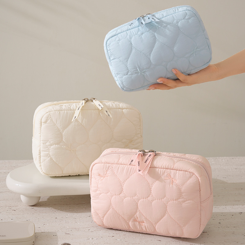 Portable makeup bag with butterfly bow design