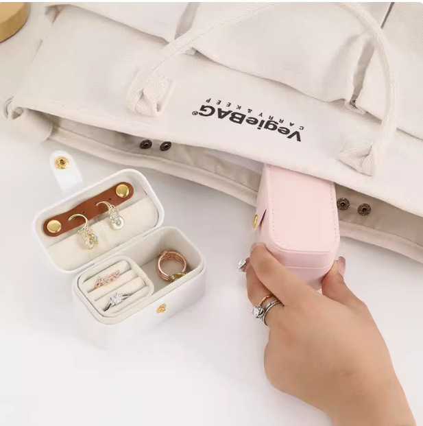 Grenzüberschreitender Amazon-Daumenfinger-Schmuckschatulle mit Magnet für Reisen, tragbar, Hochzeitsring, Ohrstecker, kleine Schmuckschatulle - 1