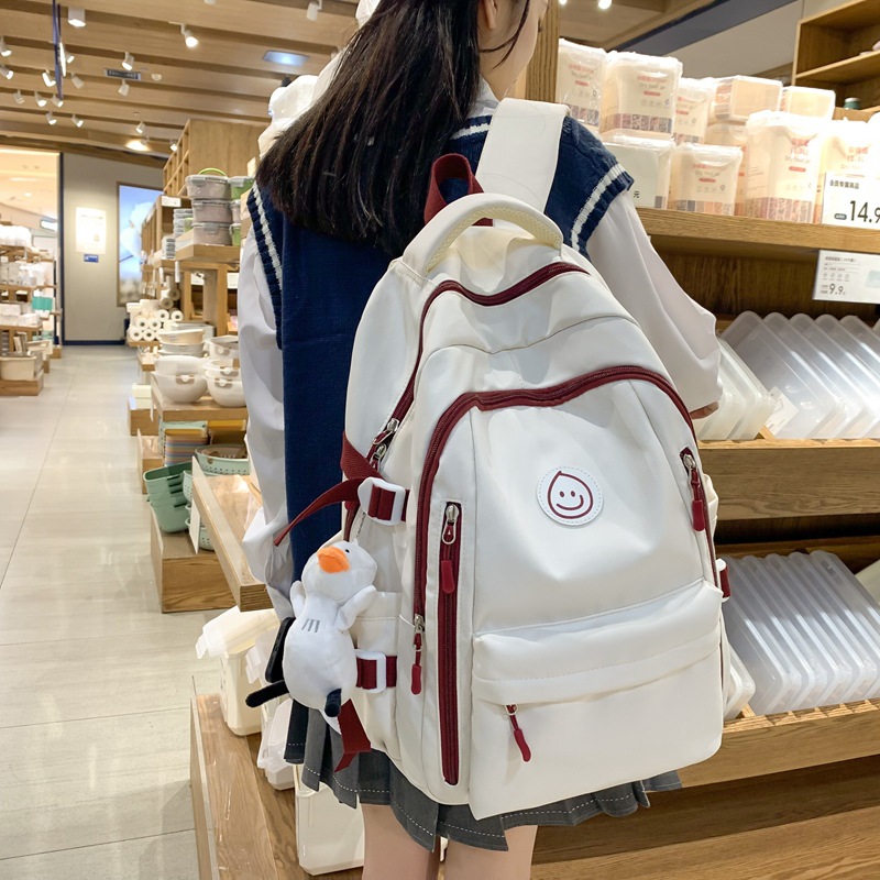 Grenzüberschreitender Rucksack koreanischer Stil Instagram-Stil vielseitiger Universitäts-Schülertasche Damen japanischer Stil Nylon-Mittelschüler-Rucksack großer Kapazität
