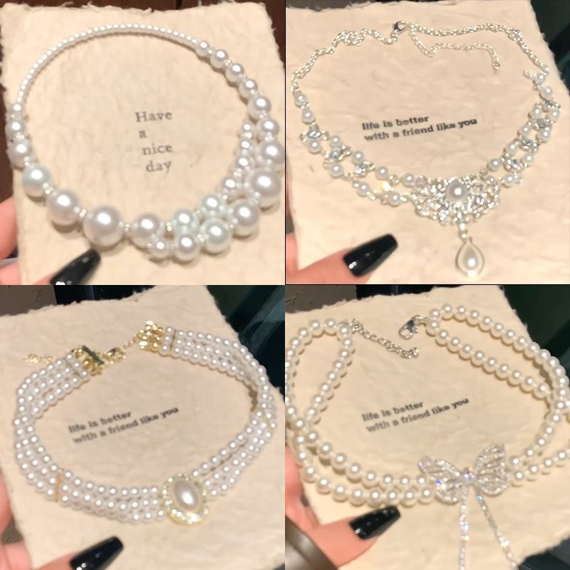 Halskette mit Perlen und Strass-Schmetterlingsdesign, Damen