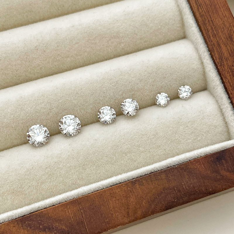 Pure Silver 999 Ear Studs with four-claw diamond setting
