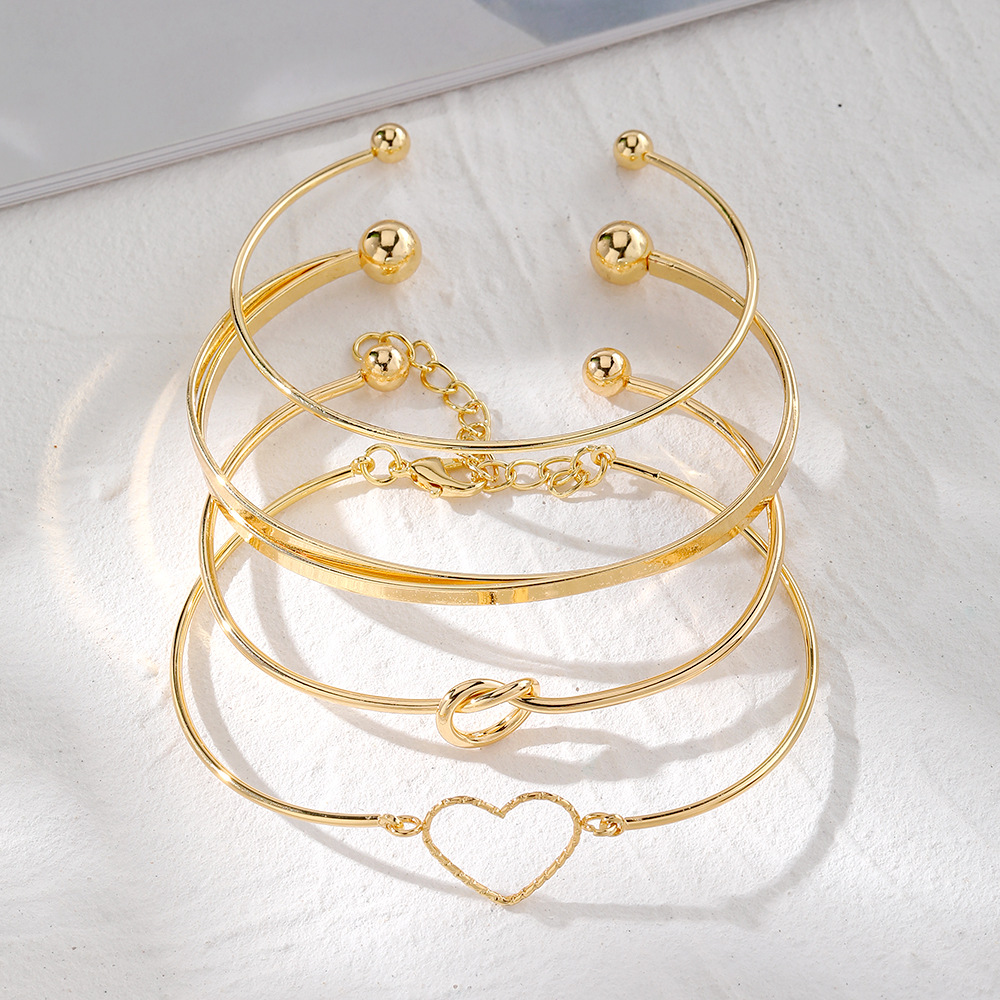 Europa und Amerika Grenzüberschreitend legiertes Herz-Knoten-Armband-Set kreatives Pfirsich-Herz geometrisches Kreuz-Armband 4er-Set Großhandel