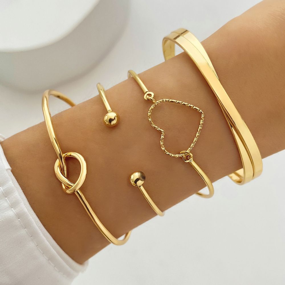 Europa und Amerika Grenzüberschreitend legiertes Herz-Knoten-Armband-Set kreatives Pfirsich-Herz geometrisches Kreuz-Armband 4er-Set Großhandel