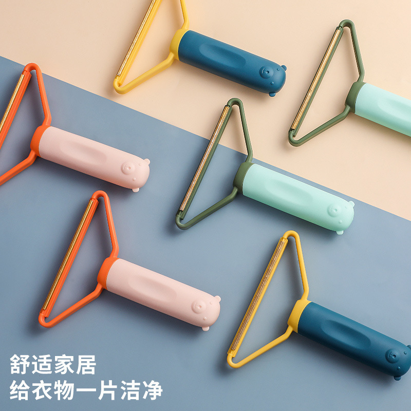 Hand-held fabric shaver, safe for home use