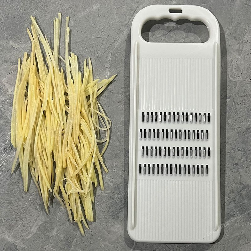 Vegetable shredder with hand guard, potato and cucumber slicer