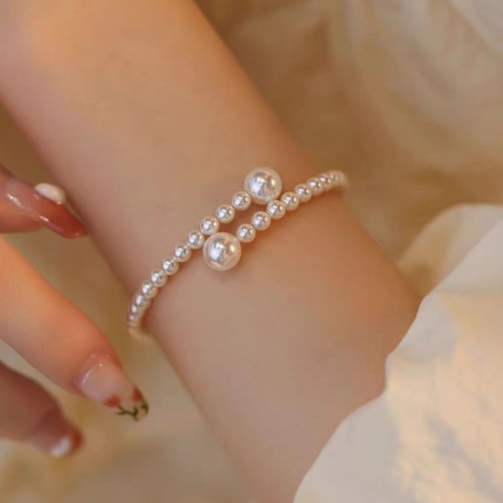 Kadınlar için Fransız retro inci bileklik, hafif lüks, sosyetik mizaç, üst düzey niş tasarım, basit ve çok yönlü moda bileklik
