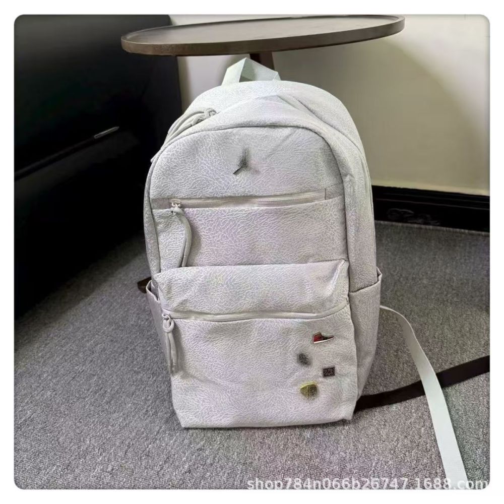 AJ Feiren 23 student backpack with badge design