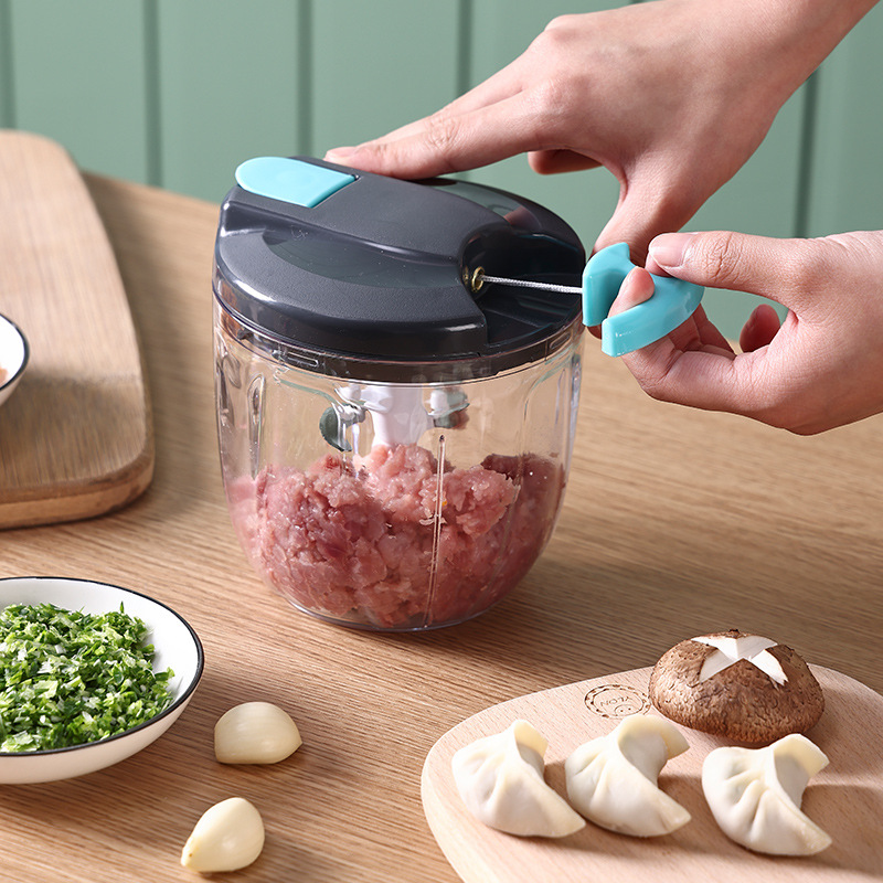 TikTok-Style kleine praktische Knoblauchpresse mit Handgriff, Farb-blockierendes Babyfutter-Supplement, vielseitiger Haushalts-Gemüseschneider, modisch