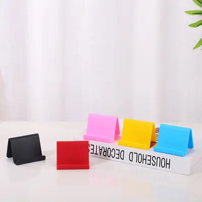 Kreativer fauler Desktop-Telefonständer des Herstellers, einfacher zusammenklappbarer Kunststoff-Telefonständer, Großhandel Geschenkartikel, bedruckbar mit LOGO. - 7