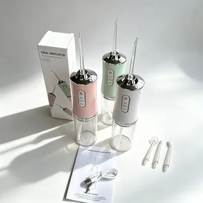 便携电动冲牙器家用3档喷水牙线洗牙器口腔清洁器带充电线三色可