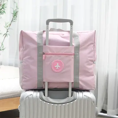 圆标飞机旅行收纳包加厚大容量衣服手提收纳袋旅游行李箱整理袋厂 - 8