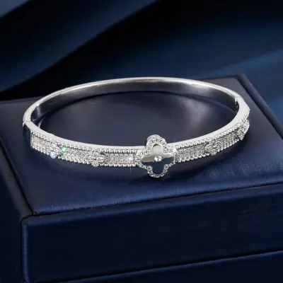Vierblatt-Blüten-Kupferarmband, vergoldet, mit Zirkonia besetzt - 4