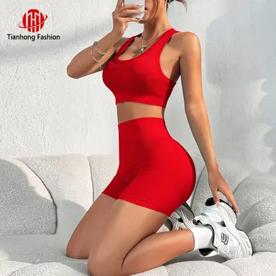 Grenzüberschreitendes Yoga-Set für Damen aus Europa und USA: nahtloser Sport-BH mit gekreuztem Rücken, Po-lifting-Shorts im Pfirsich-Stil, Trainings- und Fitness-Sportanzug