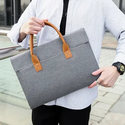 Sınır ötesi yeni moda laptop çantası iş 15.6 laptop çantası hafif ve sade erkek evrak çantası