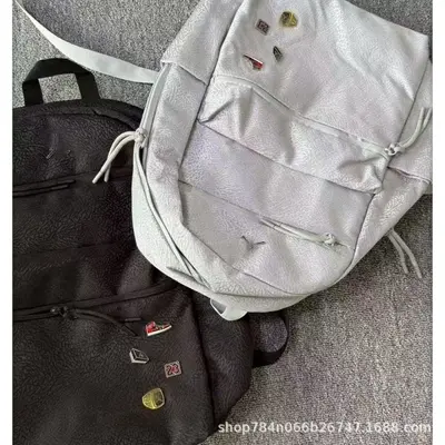 AJ Feiren 23 student backpack with badge design