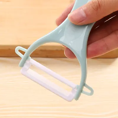 Home ceramic fruit knife, multifunctional apple peeler, vegetable peeler, potato peeler.