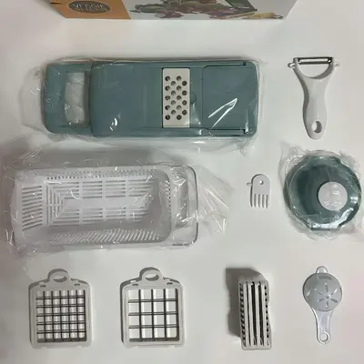 Sınır ötesi stokta bulunan çok fonksiyonlu sebze kesici, doğrama aleti, ev tipi doğrayıcı, patates rendesi, dilimleyici, mutfak aleti. - 13