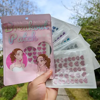 Herzförmige Akne-Patches 36er bunt mit Glitter Hydrokolloid