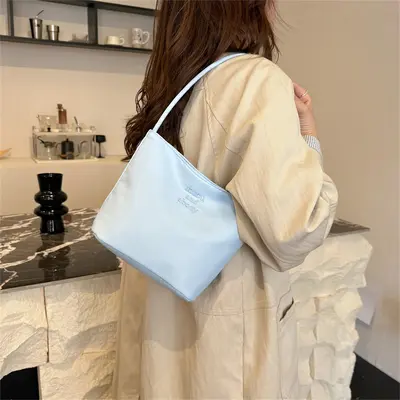 韩国much and ebong2024新款水桶包包女简约休闲百搭手提包尼龙腋 - 5