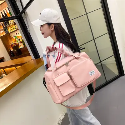 Wholesale new trend sports bags for men and women, fitness bags with dry and wet compartments, swimming Oxford fabric handheld shoulder strap travel bags
