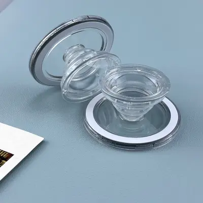 Yeni şeffaf manyetik hava yastığı tutucusu siyah ve beyaz cep telefonu tutucusu Apple, Huawei vb. için uygun teleskopik düşmeyi önleyici tutucu.