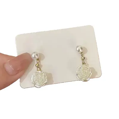 Camellia pearl earrings with rose flower design