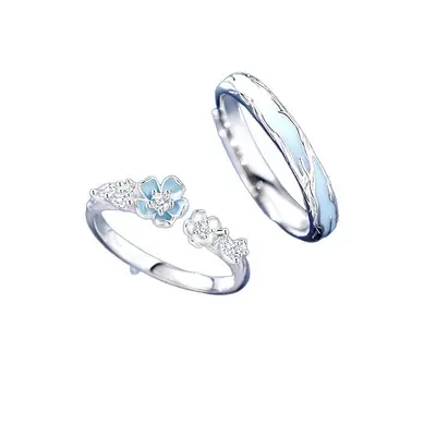 Camellia-design couple rings in silver, luxury minimalist style
