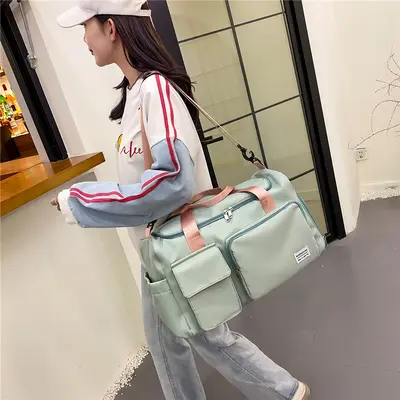 Wholesale new trend sports bags for men and women, fitness bags with dry and wet compartments, swimming Oxford fabric handheld shoulder strap travel bags