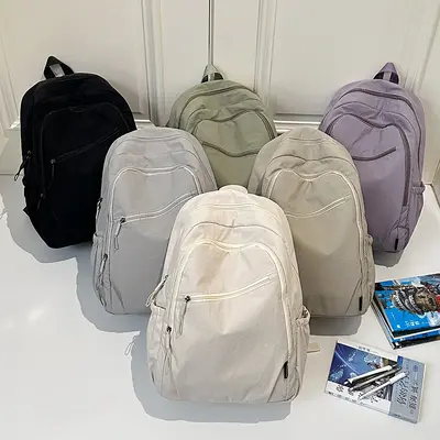 Neuer Reise- und Outdoor-Rucksack, wasserabweisend, leicht, großes Fassungsvermögen, vielseitig kombinierbar, lässiger schlichter Stil, Schultasche für Studierende
