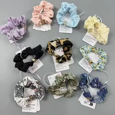 Elastic Ponytail Hair Tie with Metal Logo
