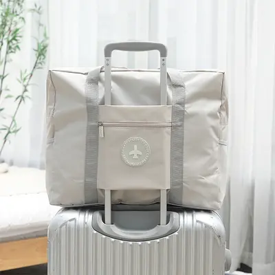 圆标飞机旅行收纳包加厚大容量衣服手提收纳袋旅游行李箱整理袋厂 - 7