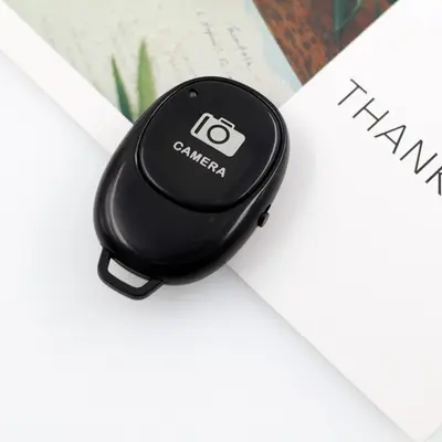 Sınır ötesi sıcak satış Bluetooth uzaktan kumanda çok fonksiyonlu şarj Android IOS cep telefonu selfie video deklanşör denetleyicisi