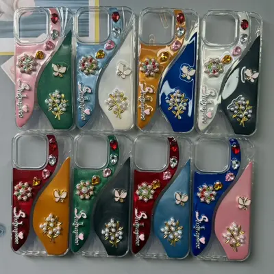 iPhone 17 Pro Max case with pearl necklace and butterfly details