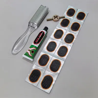 Tire Repair Patch Glue and Repair Kit for Bicycles and Motorcycles - 11