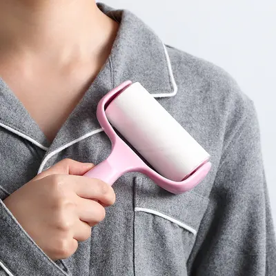 Home clothing cotton lint cleaner hand tearable dust paper roll hair remover dust brush cotton lint roll pet hair cotton lint cleaner