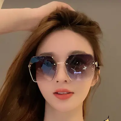 2025 New Style UV-Proof Gradient Sunglasses Women Large Face Sun Protection Rimless Sunglasses Premium Look