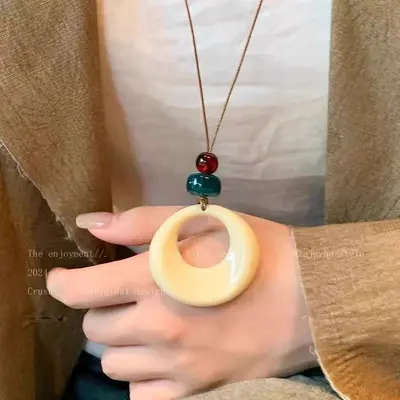Round ring pendant necklace, black cord, long chain style - 8