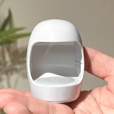 Yeni mini yumurta kabuğu manikür lambası UV fototerapi makinesi küçük taşınabilir çabuk kuruyan oje tutkal pişirme lambası kurutma lambası toptan
