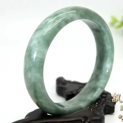 Natural green jade women's bracelet, light green with floral pattern