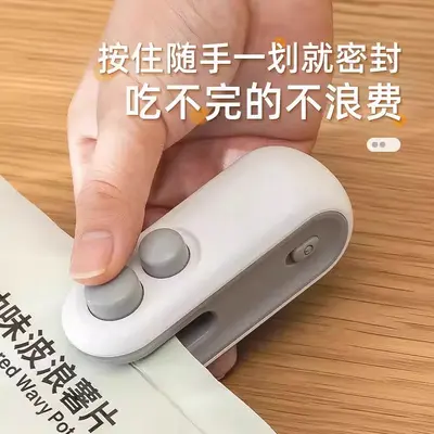 Mini hand-press plastic bag sealing machine