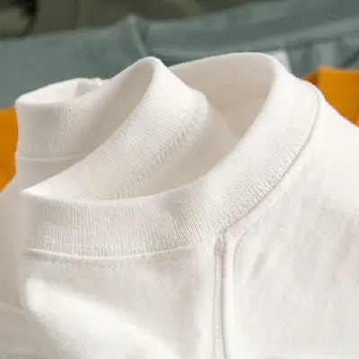Weiße Kurzarm-T-Shirts aus 100% reiner Baumwolle für Damen und Herren 230G INS Fashion schwere undurchsichtige Rundhals uni Basis-Unterhemd Großhandel - 7