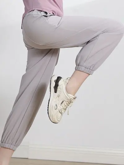 Yeni stil kadın bol paça jogger hızlı kuruyan yoga pantolonu dar kesim koşu fitness nefes alan günlük pantolon