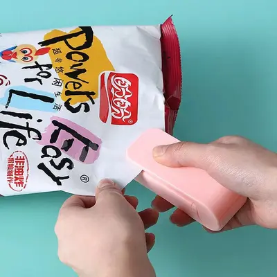 Mini portable hand-press heat sealer for plastic bags