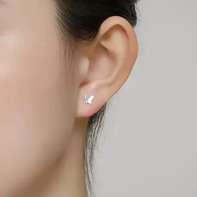 Kadınlar için 999 ayar gümüş küpeler, yeni trend lüks kulak piercing küpeleri, küçük zarif öğrenci kulak kemiği çivileri toptan