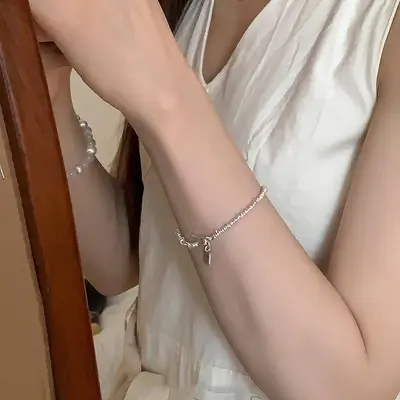 迈思卡通体足银999小鱼方牌手链女韩国高级小众设计复古盘缠手环