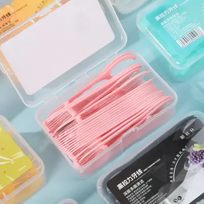 Kreative fruchtaromatisierte Zahnseide Familienpackung, einzeln verpackt, frischer Atem, tiefe Reinigungswirkung, tragbare farbige Zahnseide