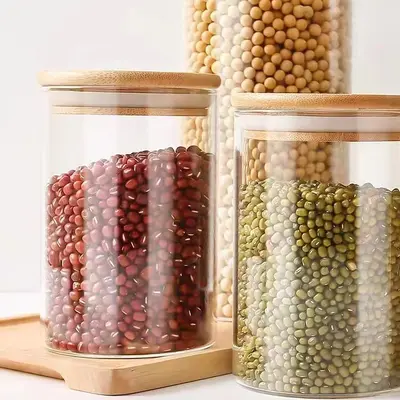 Hersteller Großhandel mit hohem Borosilikatglas, versiegeltes Glas, Aufbewahrungsflasche, Süßigkeiten-Aufbewahrungsglas, gerades Rohr, Teeglas, Bambusdeckel, Teeglas