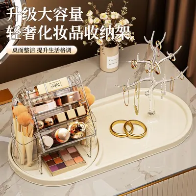 Rotating cosmetics and jewelry storage box